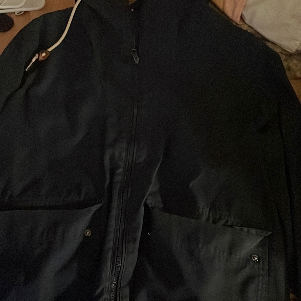 navy blue windbreaker